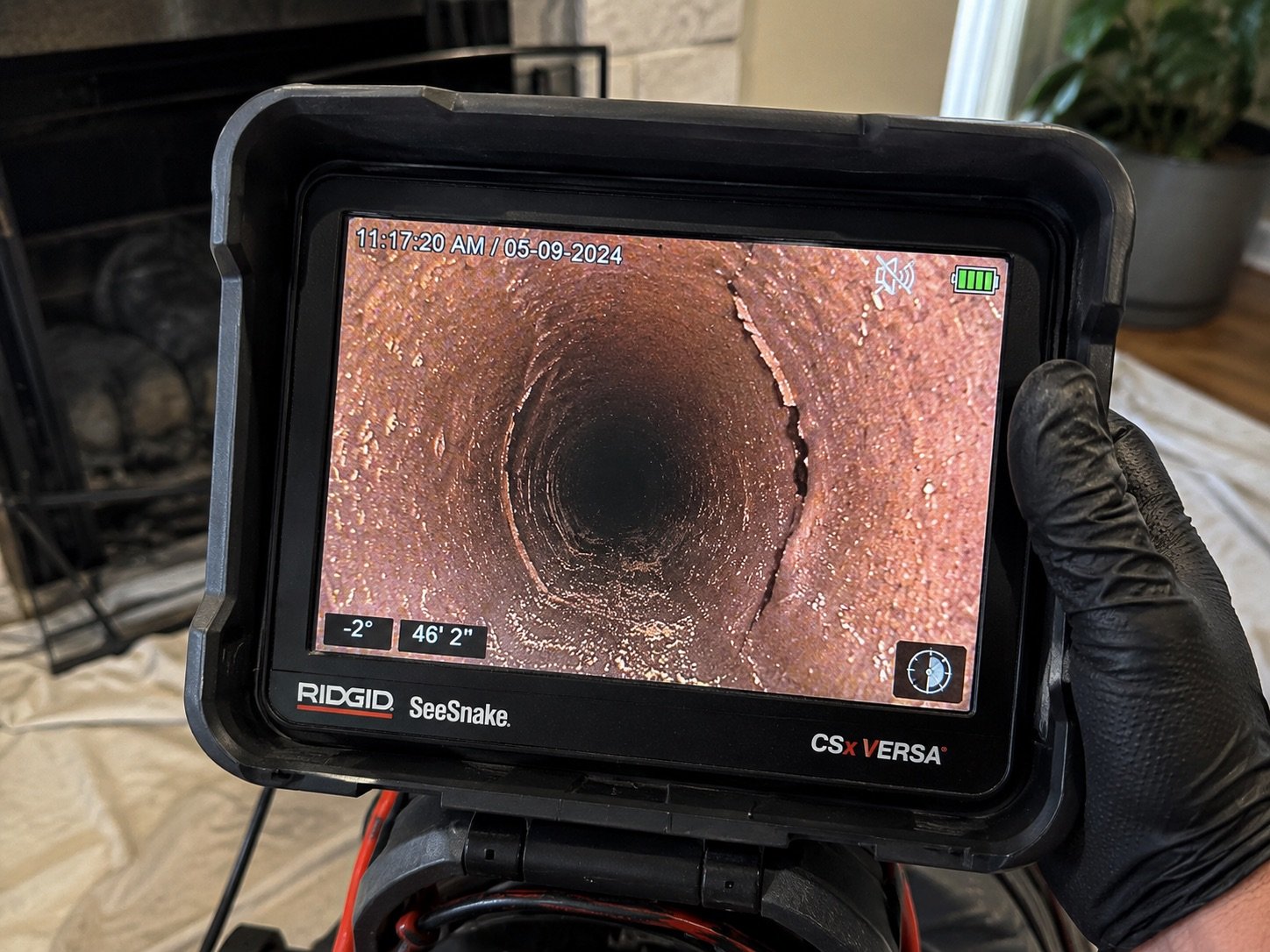 Video scan showing a cracked clay flue liner